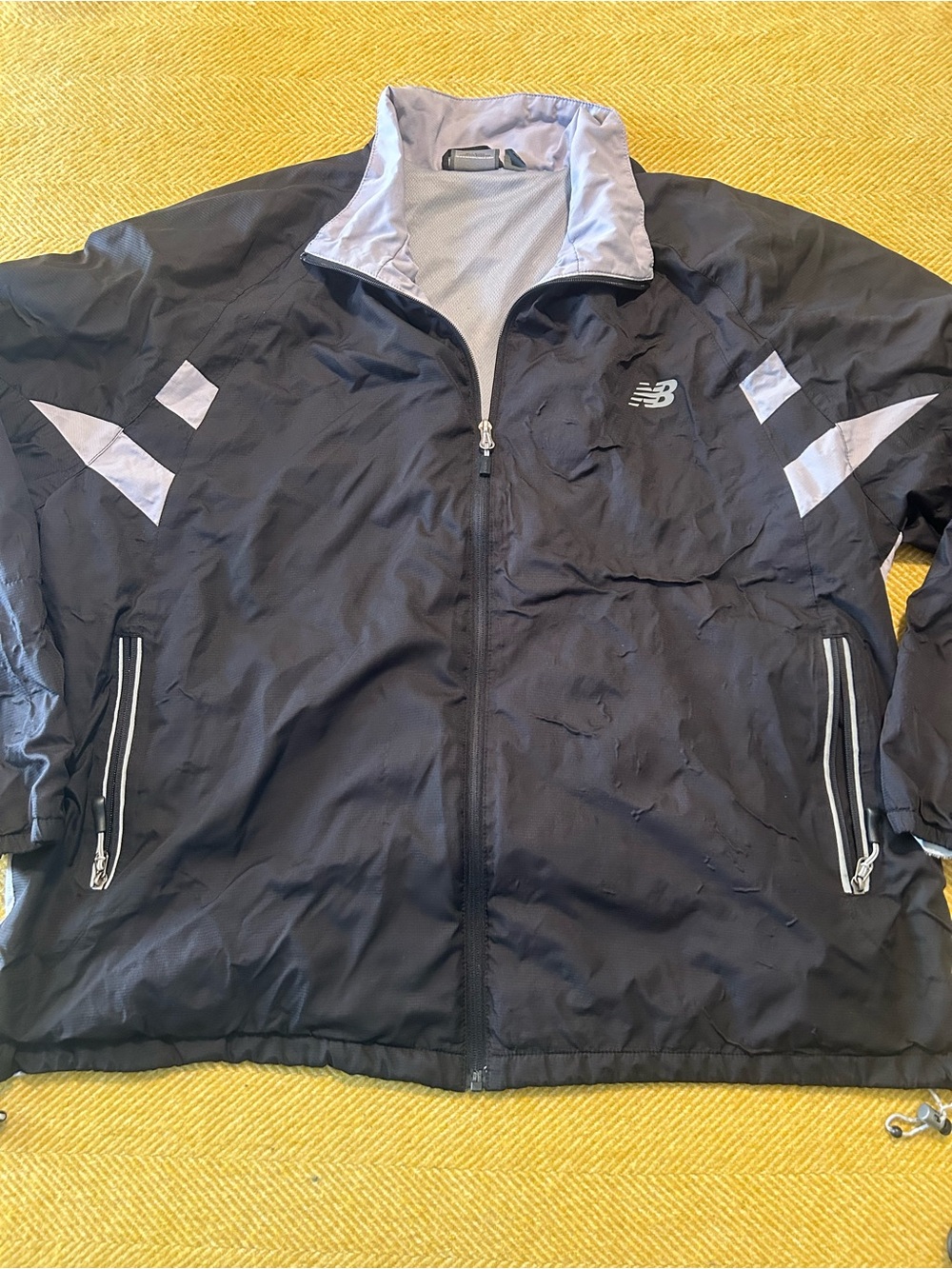 New Balance Men's Black Windbreaker Jacket with Light Gray Accents